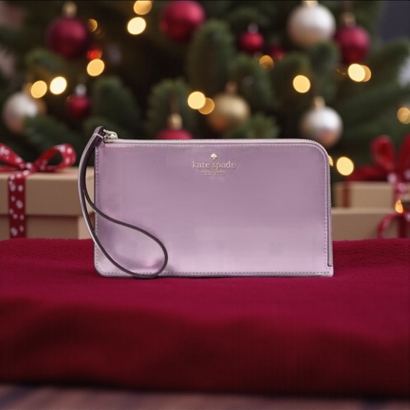 kate spade Handbags - Kate Spade Lucy Medium L- Zip Wristlet in Quartz Pink